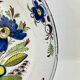 Delftware plate in white and blue with floral decoration, 18th century, Ø 36.5 cm