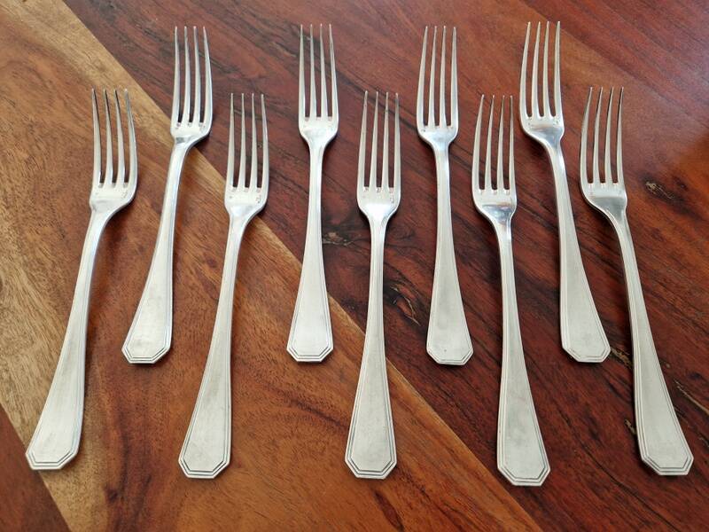 9 fourchettes de table Christofle en métal argenté modèle America - Design Luc Lanel