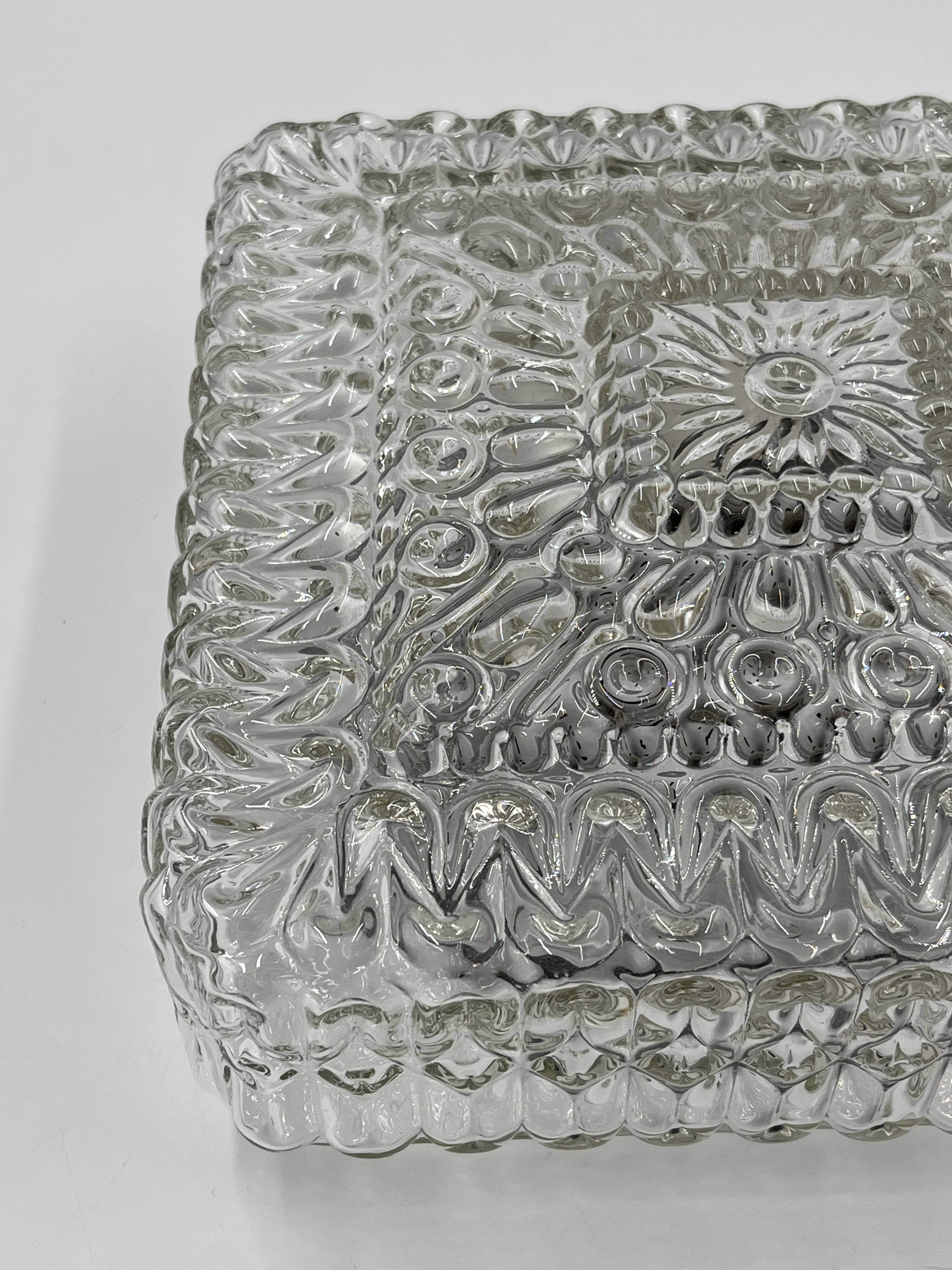 Square ceiling light in embossed molded glass