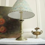 Brass candlestick lamp with its fabric lampshade by William Morris