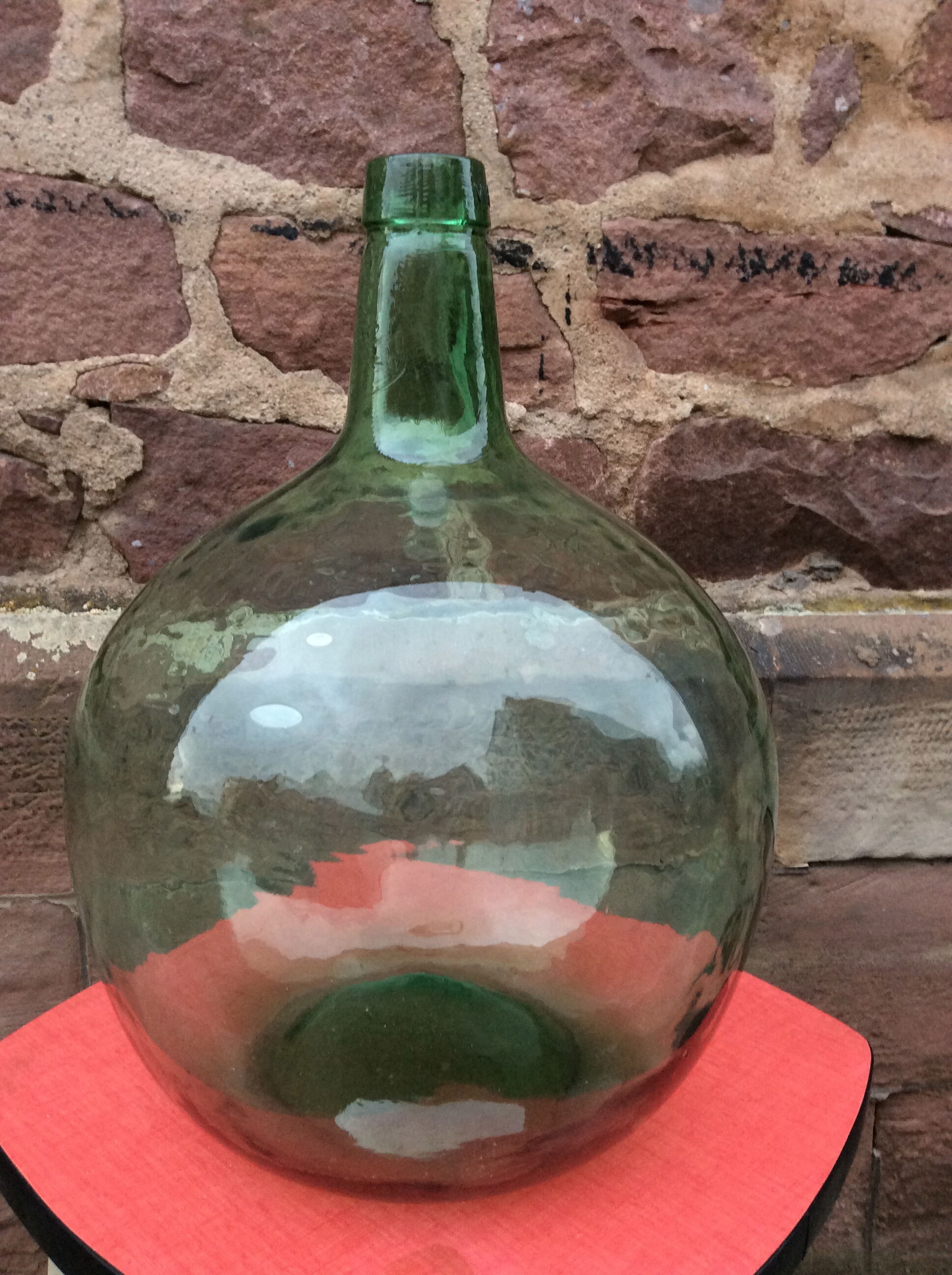 Demijohn bottle in green glass, 15-litre capacity