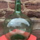 Demijohn bottle in green glass, 15-litre capacity