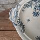 Shallow round plate Boch Frères model Regent with arabesque and foliage decoration.