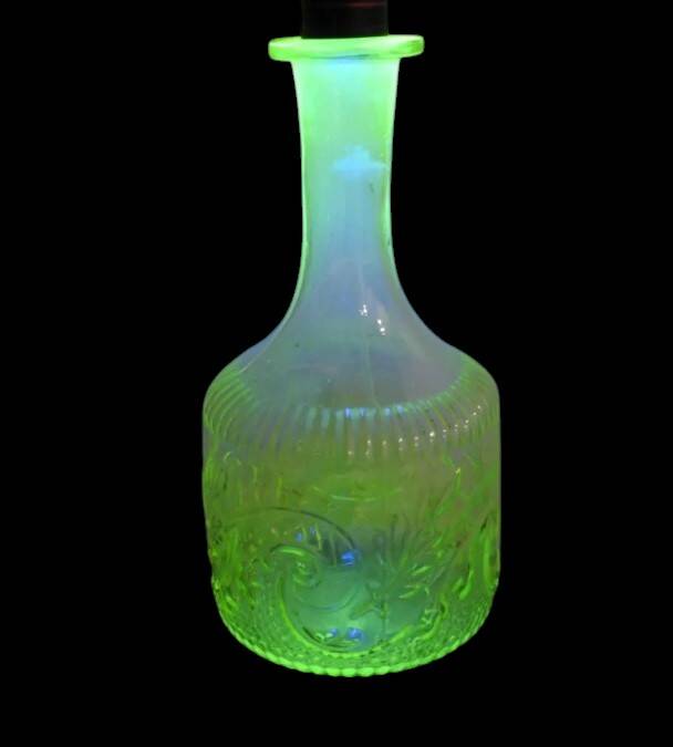 Antique uraline glass carafe bottle from the late 19th century