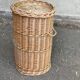 Woven laundry basket with rattan and wicker lid
