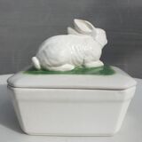 Pot terrine rabbit of Bavent in white earthenware on square of greenery