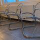 Suite of 4 suspended chairs Chromées Modele Sabrina by Gastone RINALDI