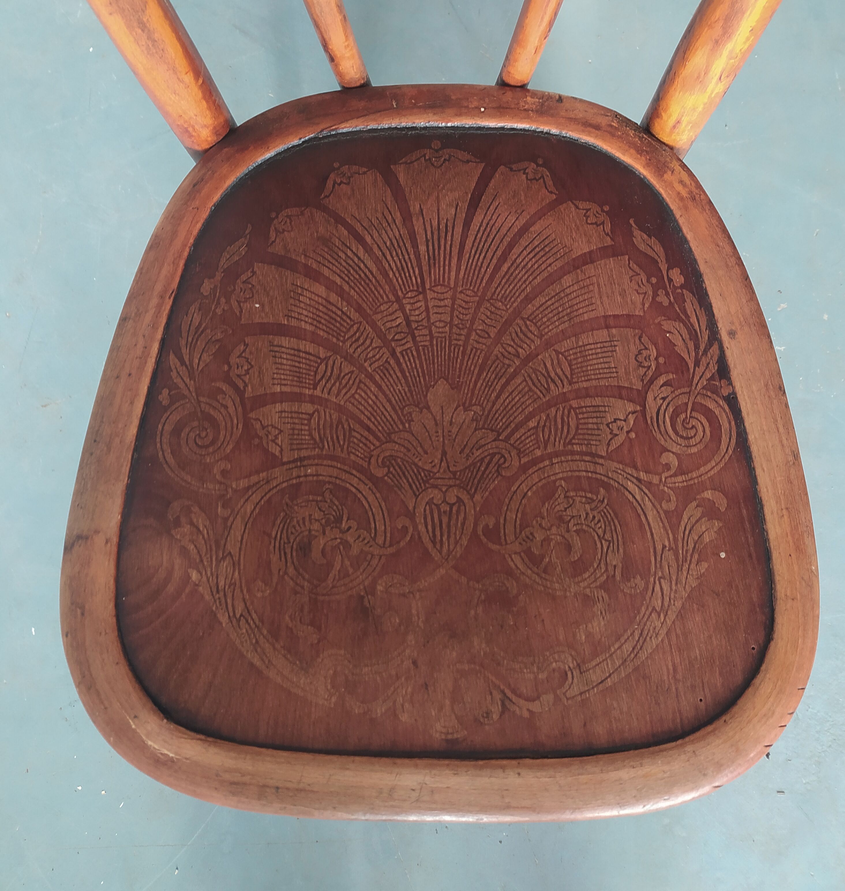 Curved wooden bistro chair