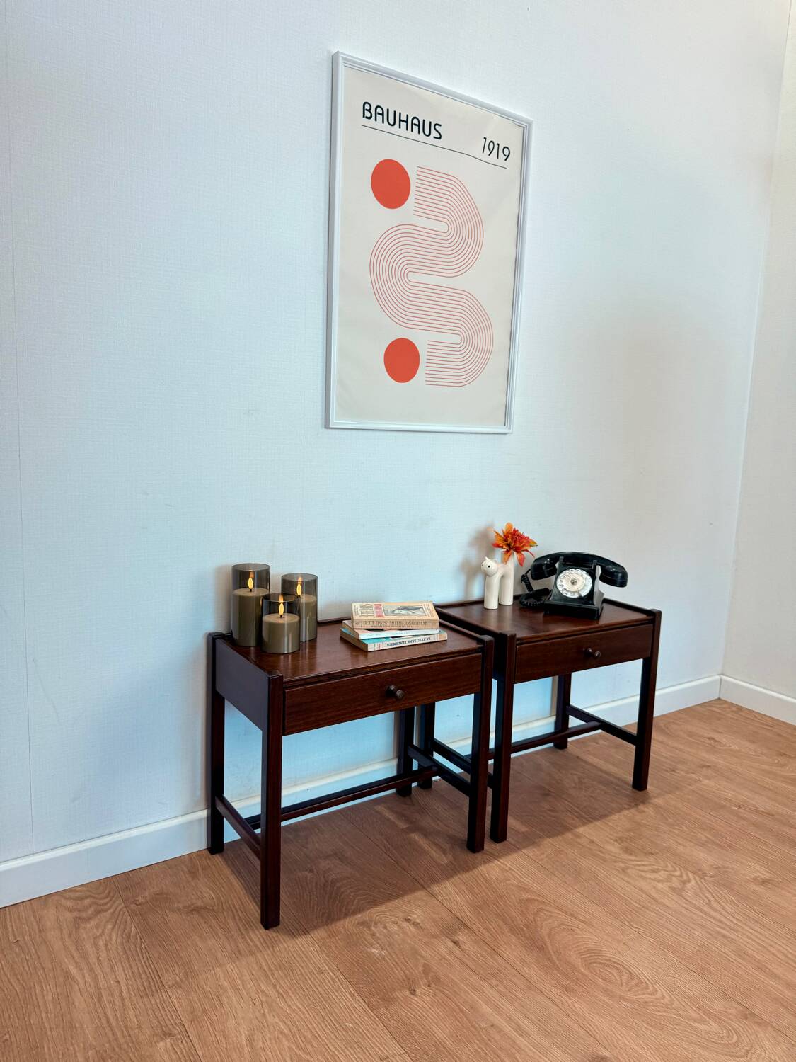 Pair of walnut bedside tables designed by Jacques Hauville for Roche Bobois.