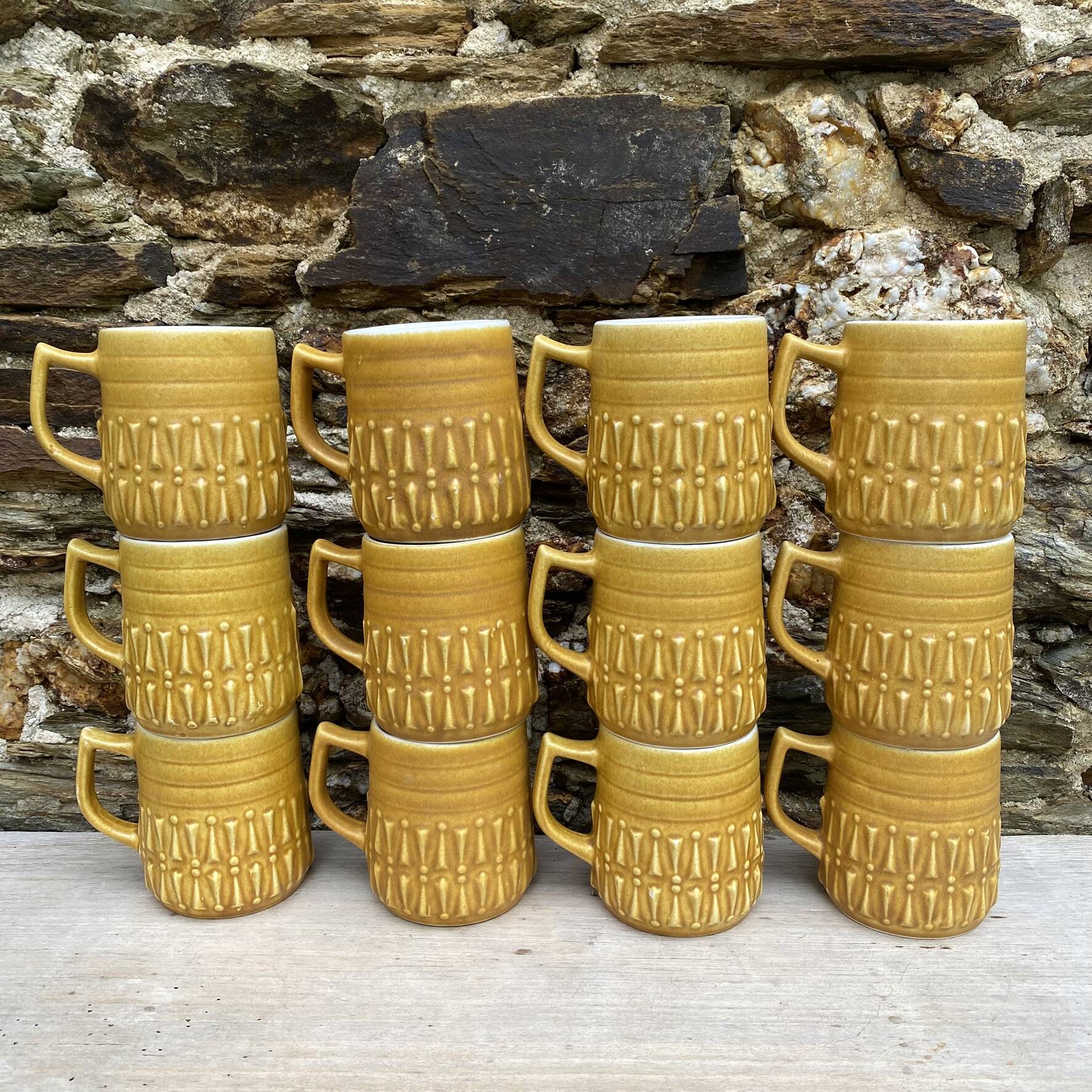 Vintage BP ceramic mugs from the 1970s.