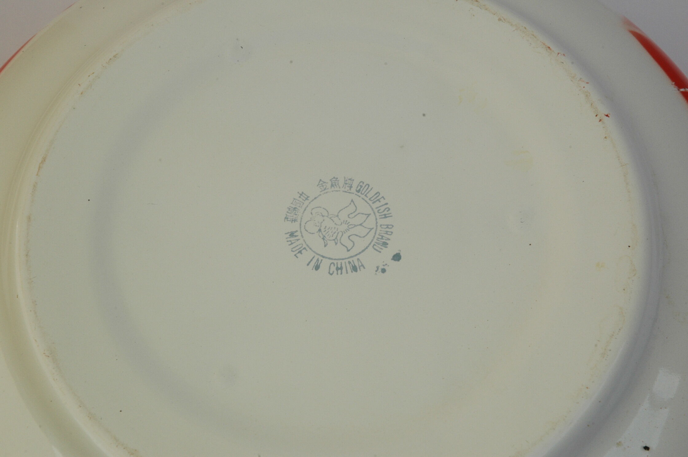 Cocotte en tôle émaillée orange et blanche