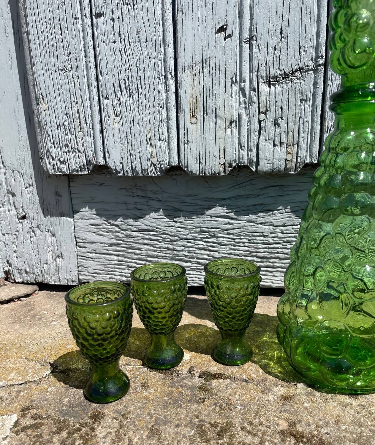 Liqueur service coloured glass empoli, vintage green carafe