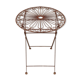 Ancient wrought iron pedestal table