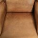 Set of two light cowhide wingback armchairs with a timeless English look