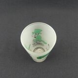 Glass illustrated by Cabu on the theme of the circus, 3 learned monkeys on a bike, green
