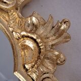 Wooden and gilded mirror with gold leaf