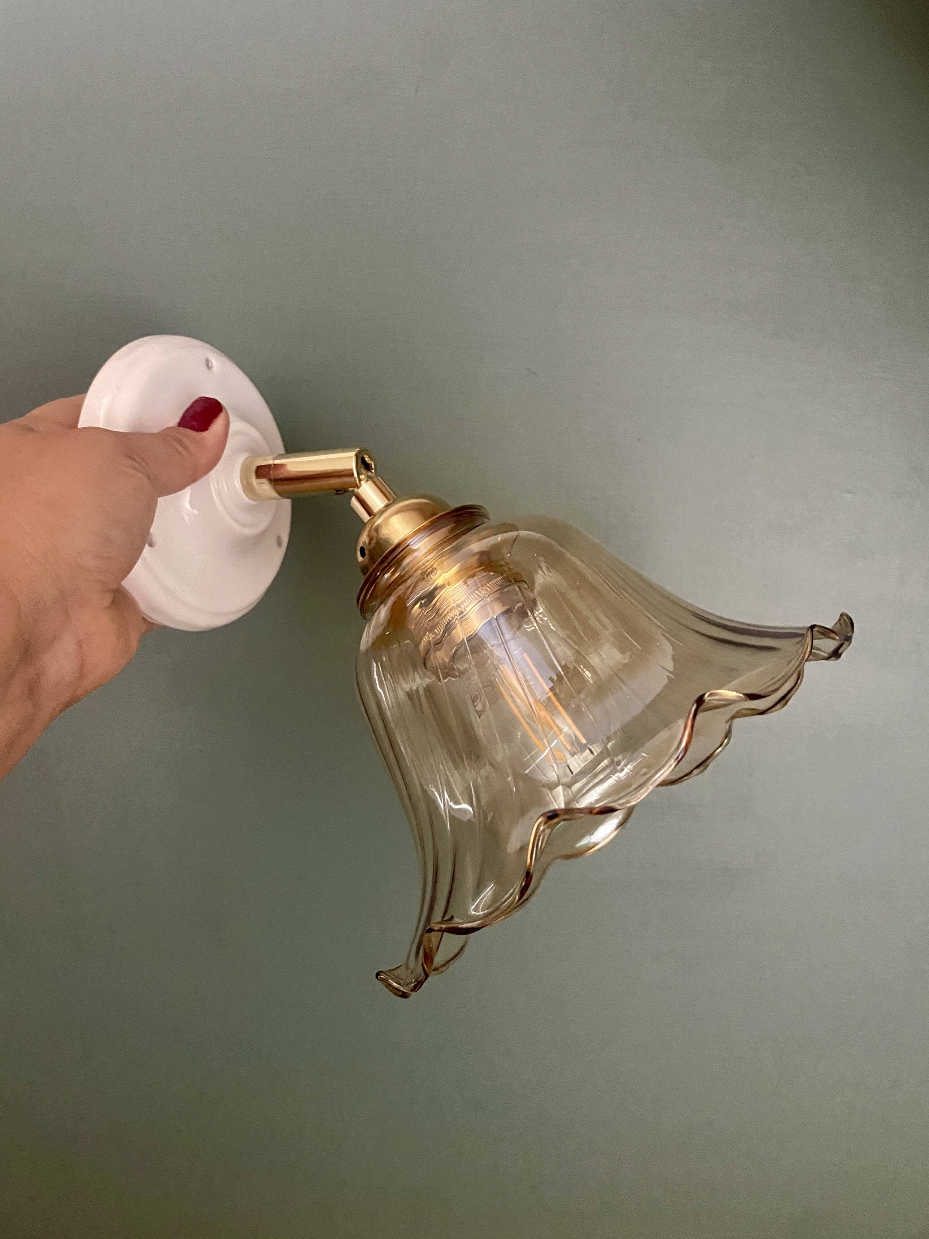Vintage tulip wall light in amber glass