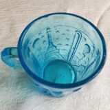 Old turquoise glass cup