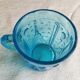 Old turquoise glass cup