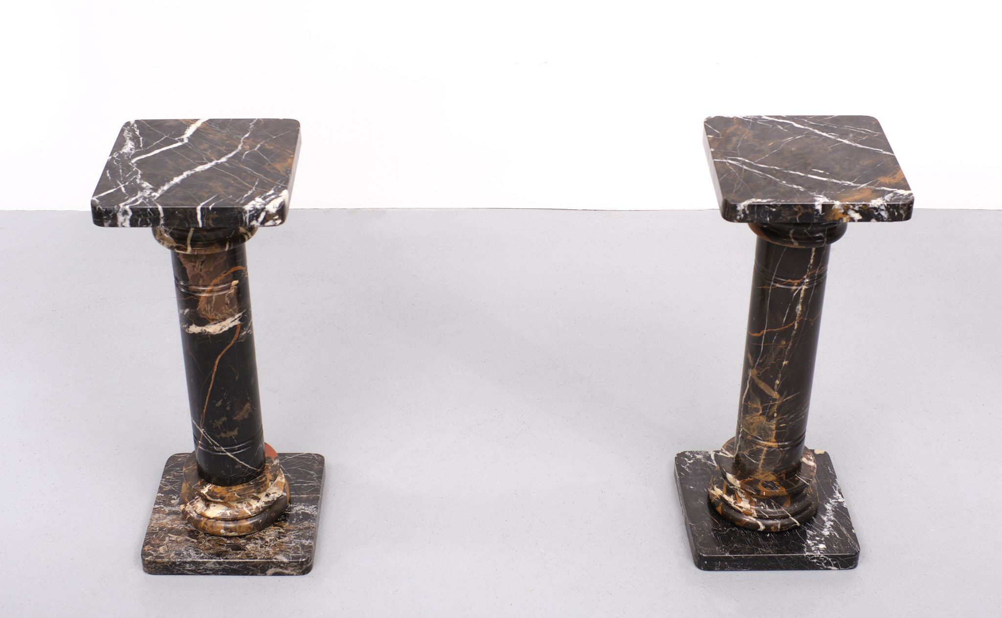 Two black portoro marble pedestals, Italy
