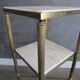 Marble pedestal table and brass hollywood regency