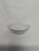 White earthenware soup tureen with a golden pattern.