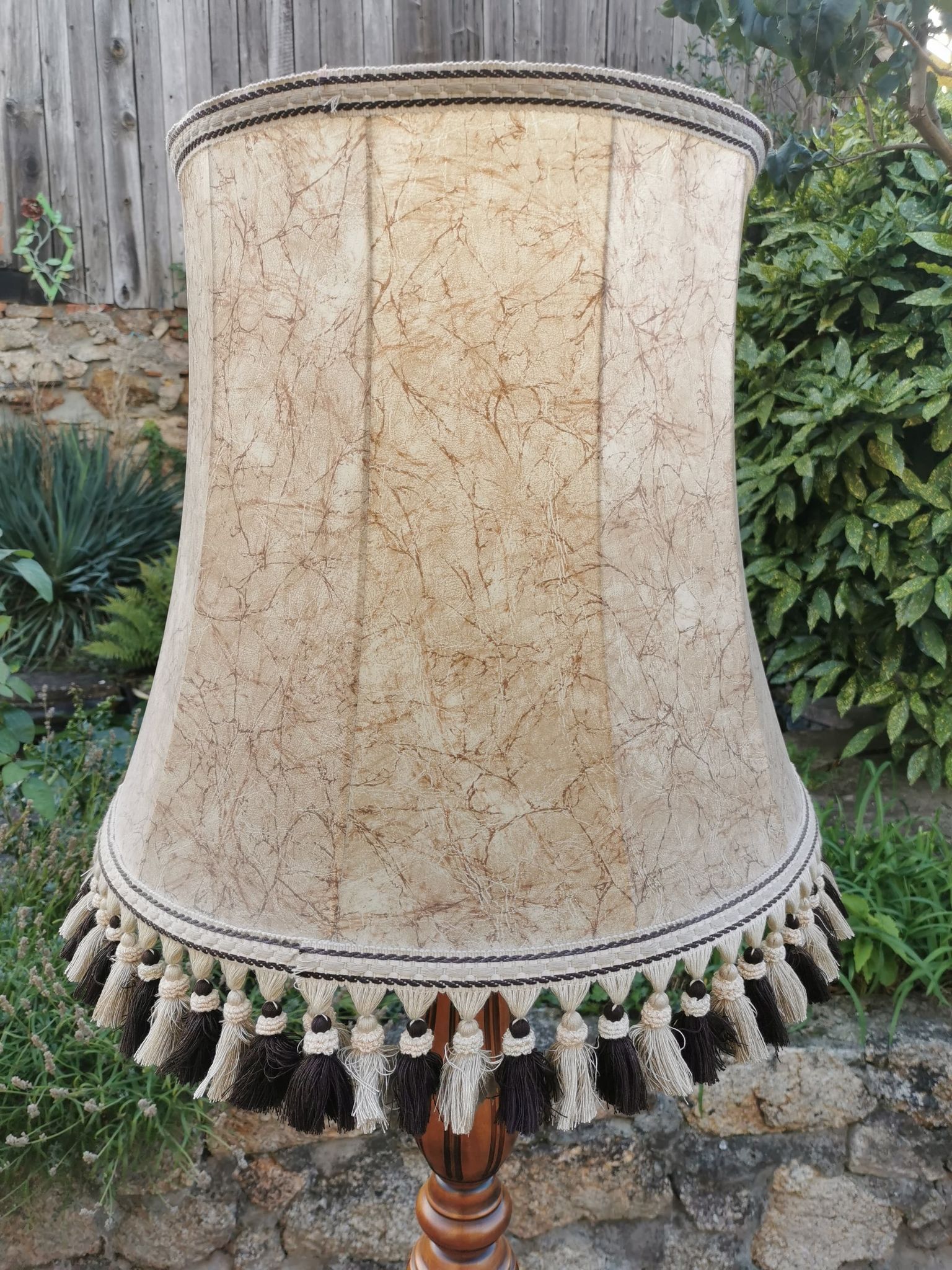 Turned wooden floor lamp with lampshade