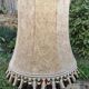 Turned wooden floor lamp with lampshade