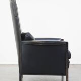 Fauteuil design en cuir noir de Giorgetti