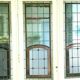 Separation of three doors in 20th century Art Deco stained glass