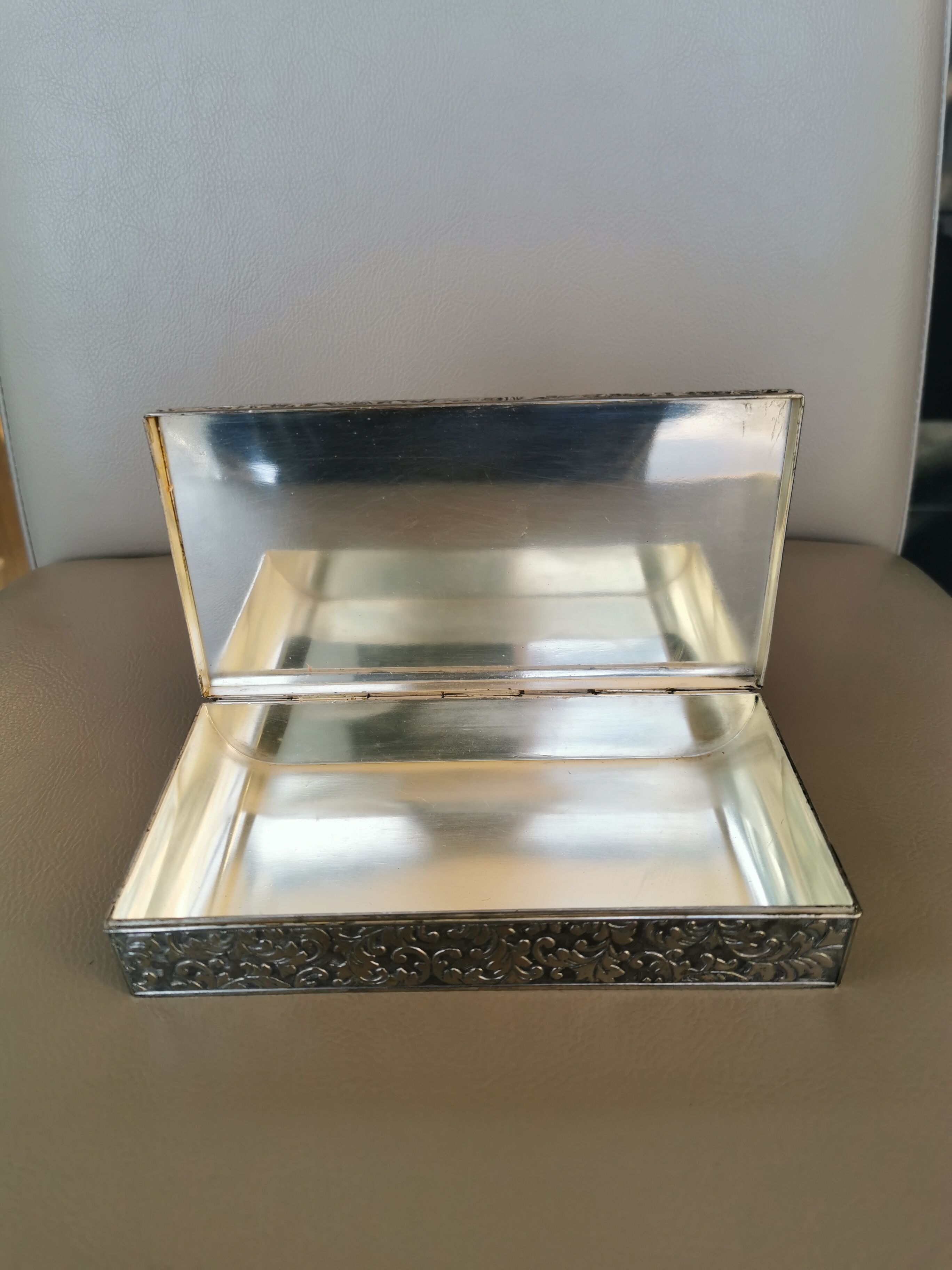 Old box in chiseled silver metal
