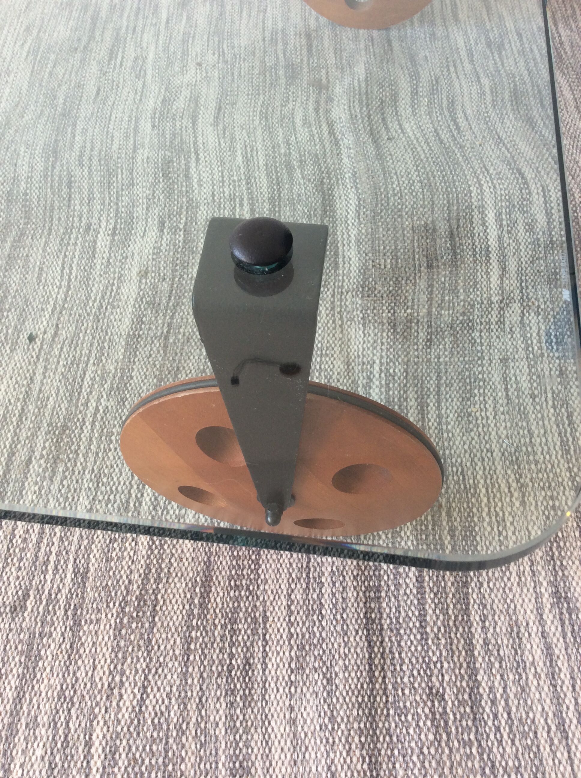 Glass coffee table on teak wheels