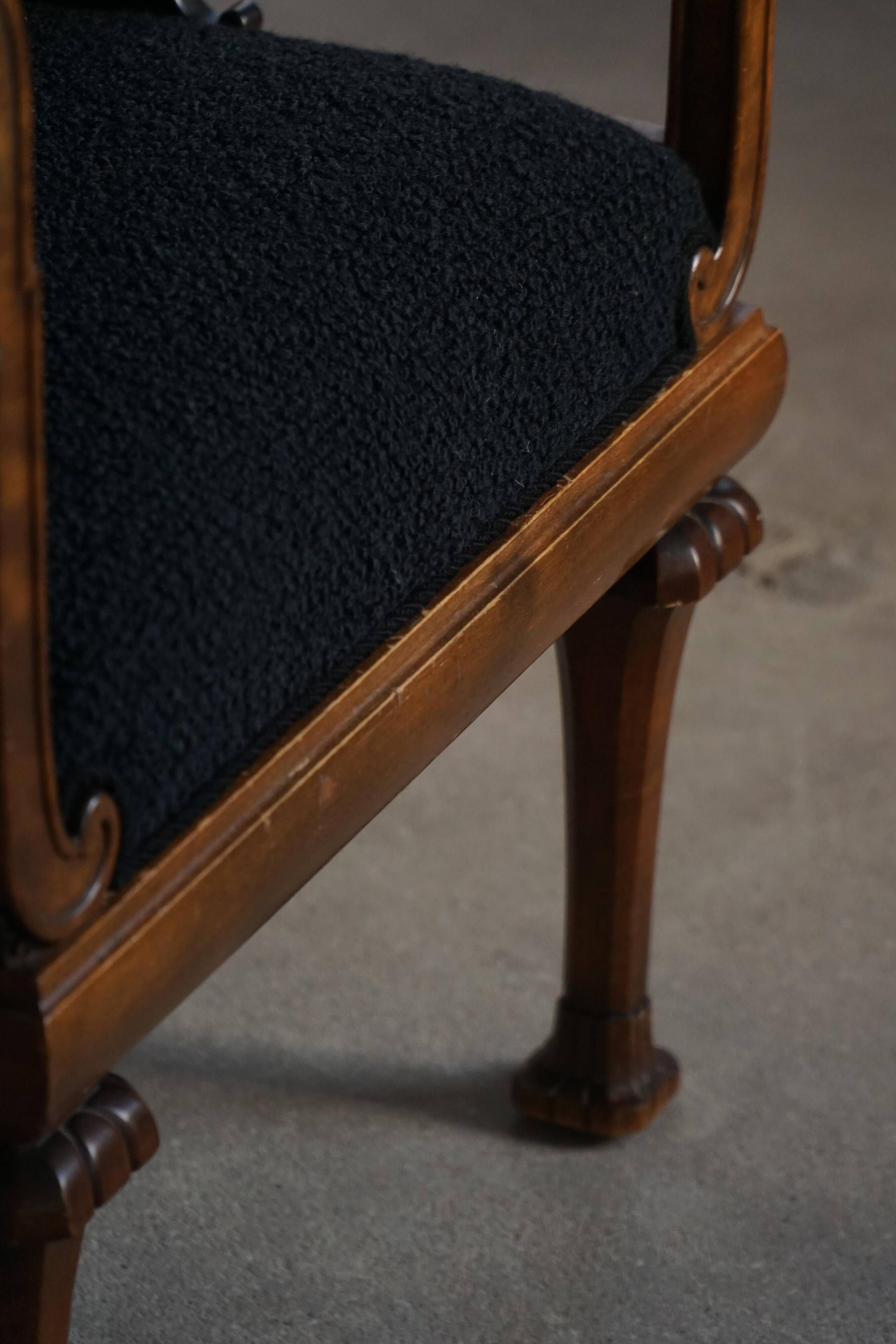 Early 20th century Danish Art Nouveau armchair, reupholstered in charcoal boucle.
