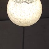 Table lamp with a pale green Clichy glass globe.