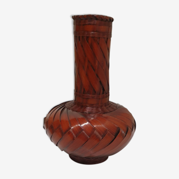 Vase made of braided bamboo leaves