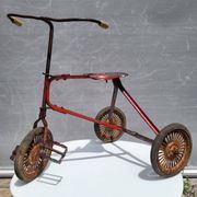 Riveted metal children's tricycle 1920 • Urbex style