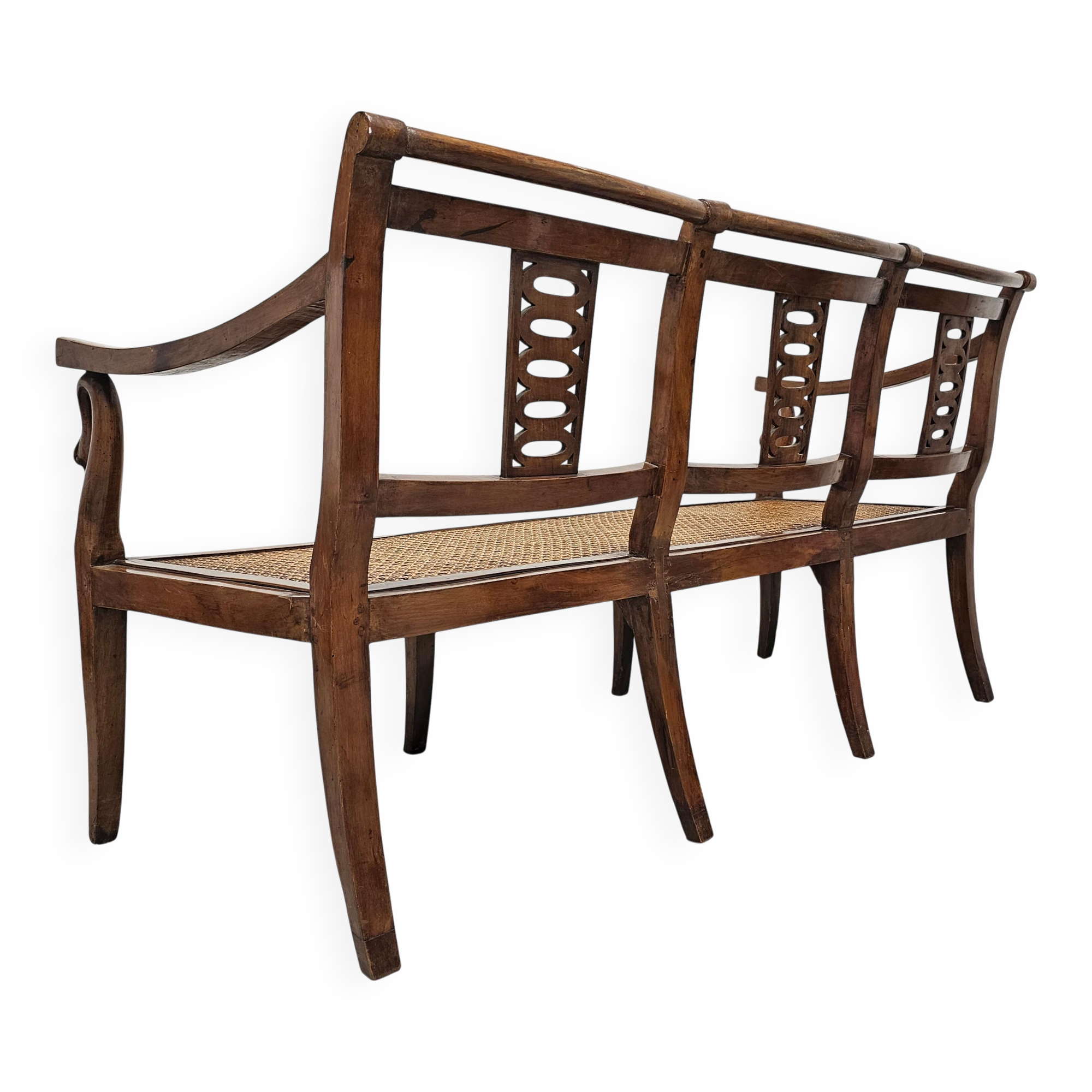Directoire canapé in walnut with brass inlays, late 18th century.