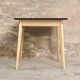 Vintage table in solid beech and black laminate tray