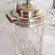 Salt, pepper and mustard shaker set in chiseled glass and silver metal