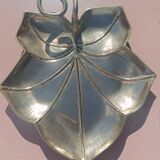 Gilded brass leaf pocket emptier