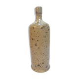 Bouteille en grès mouchetée