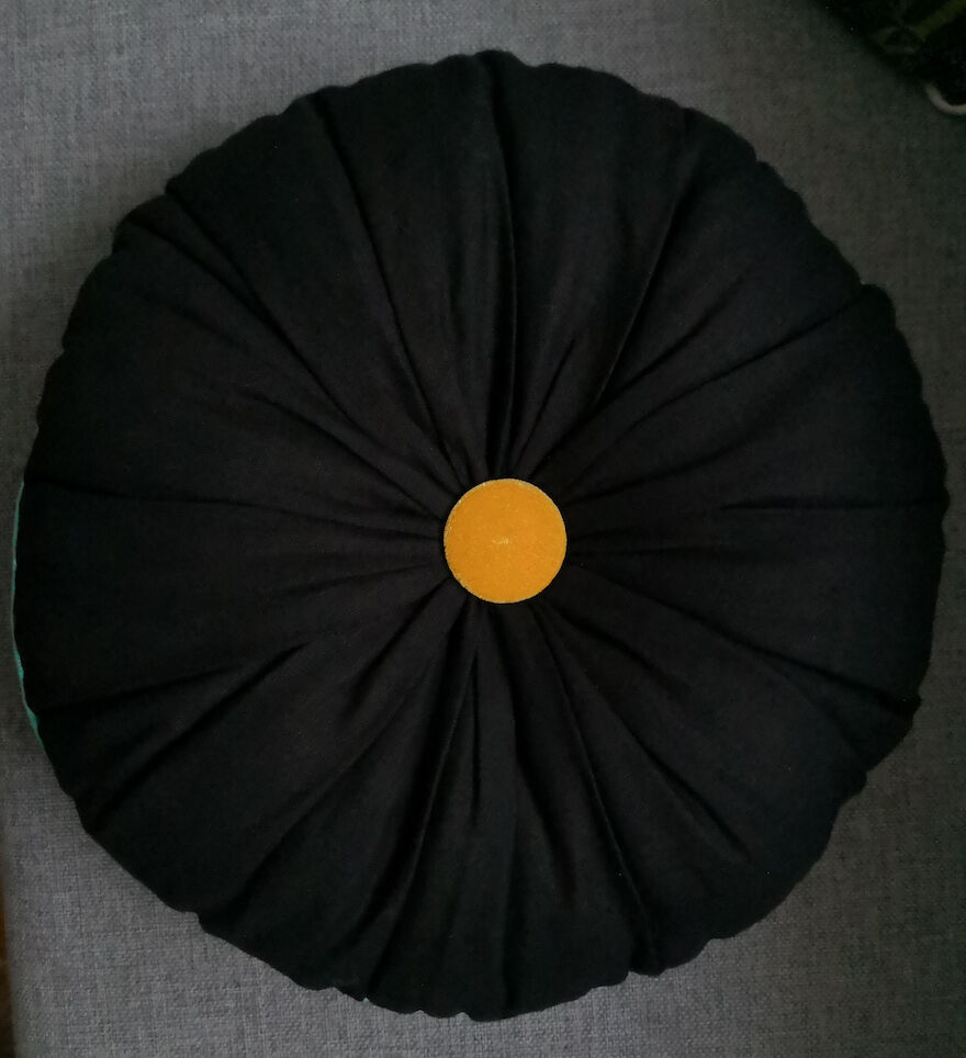 Turquoise round cushion