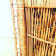 Fauteuil vintage à tablette en osier