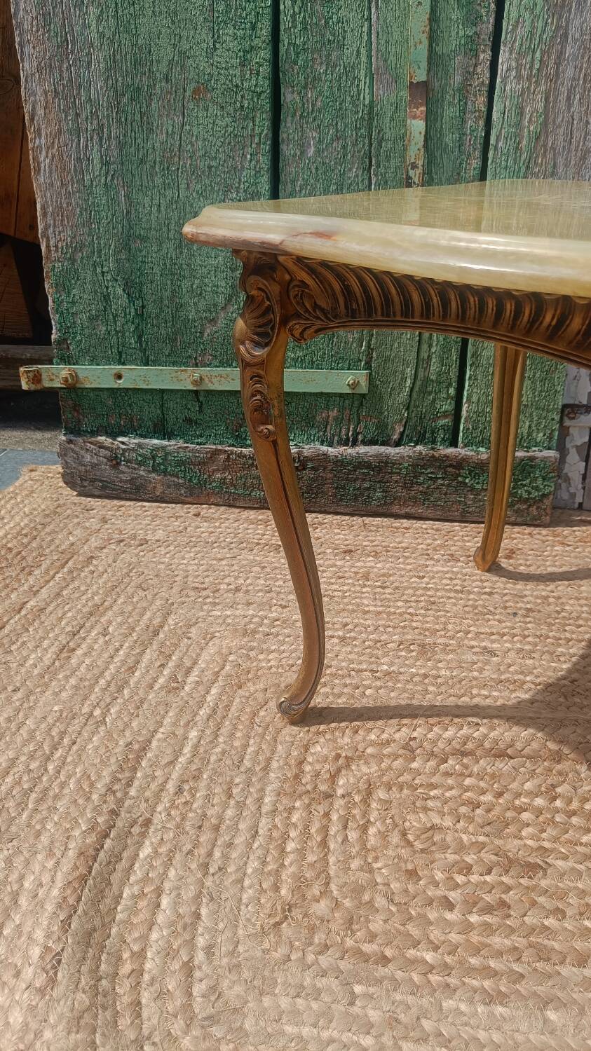 Vintage side table in gilded brass with an onyx top.