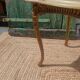 Vintage side table in gilded brass with an onyx top.