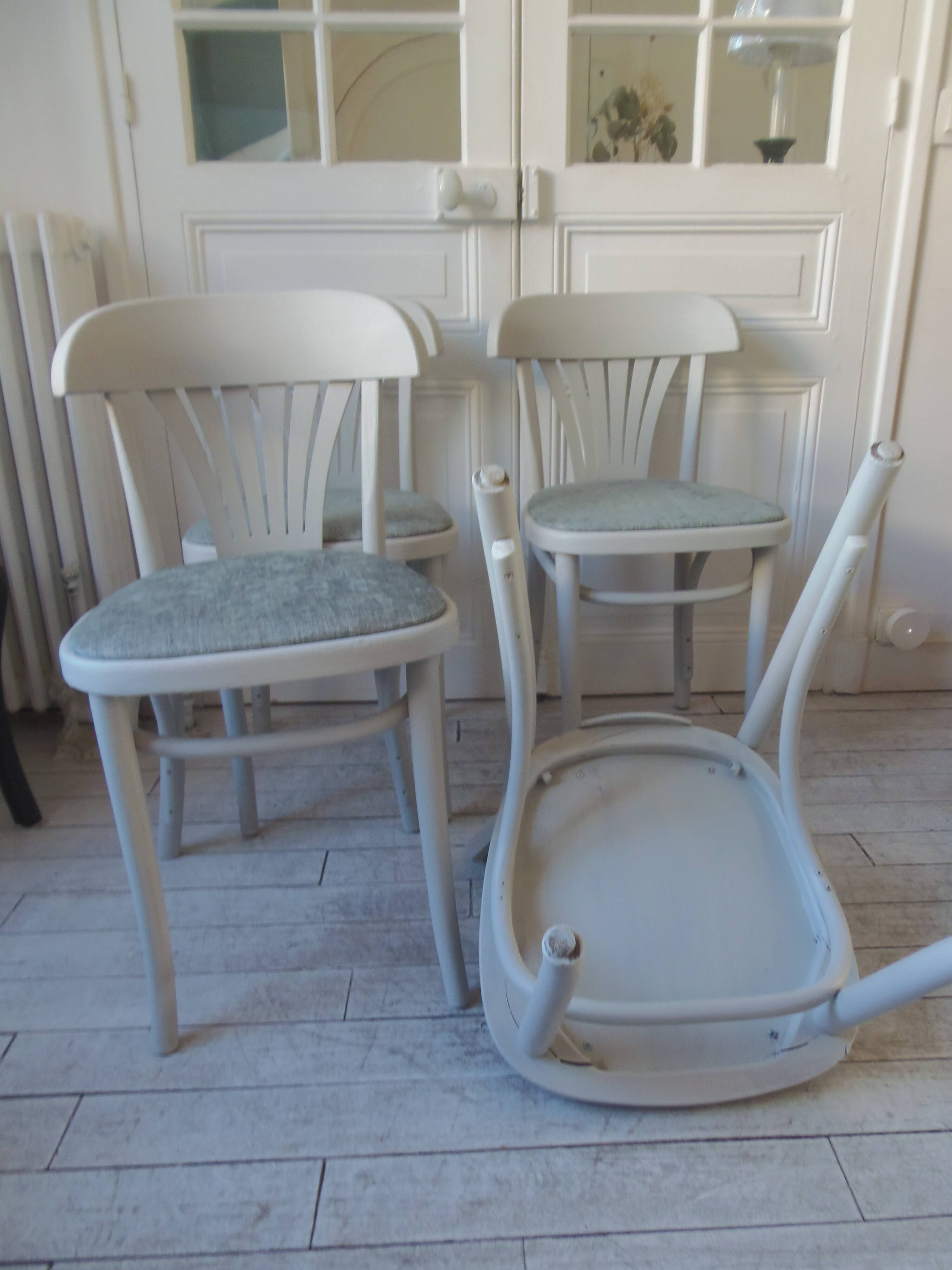 Set of 4 vintage bistro chairs enhanced in pearl grey.