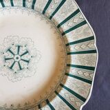 A plate made of earthenware decorated with flower crown