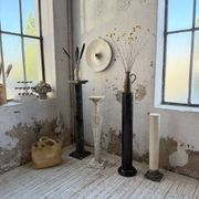 Set of 4 marble columns or pedestals.
