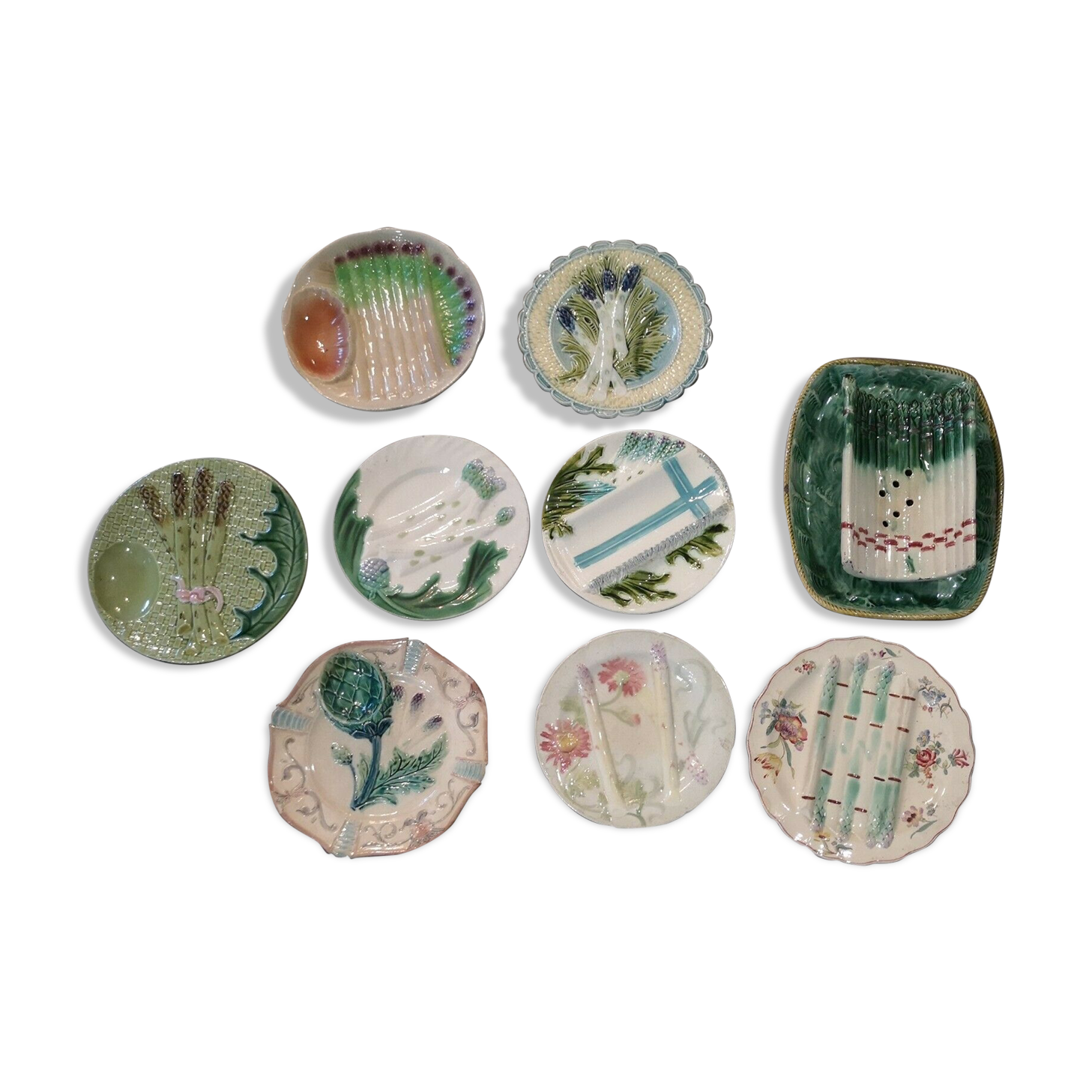 Set of 9 dishes and majolica asparagus plates from different manufactures