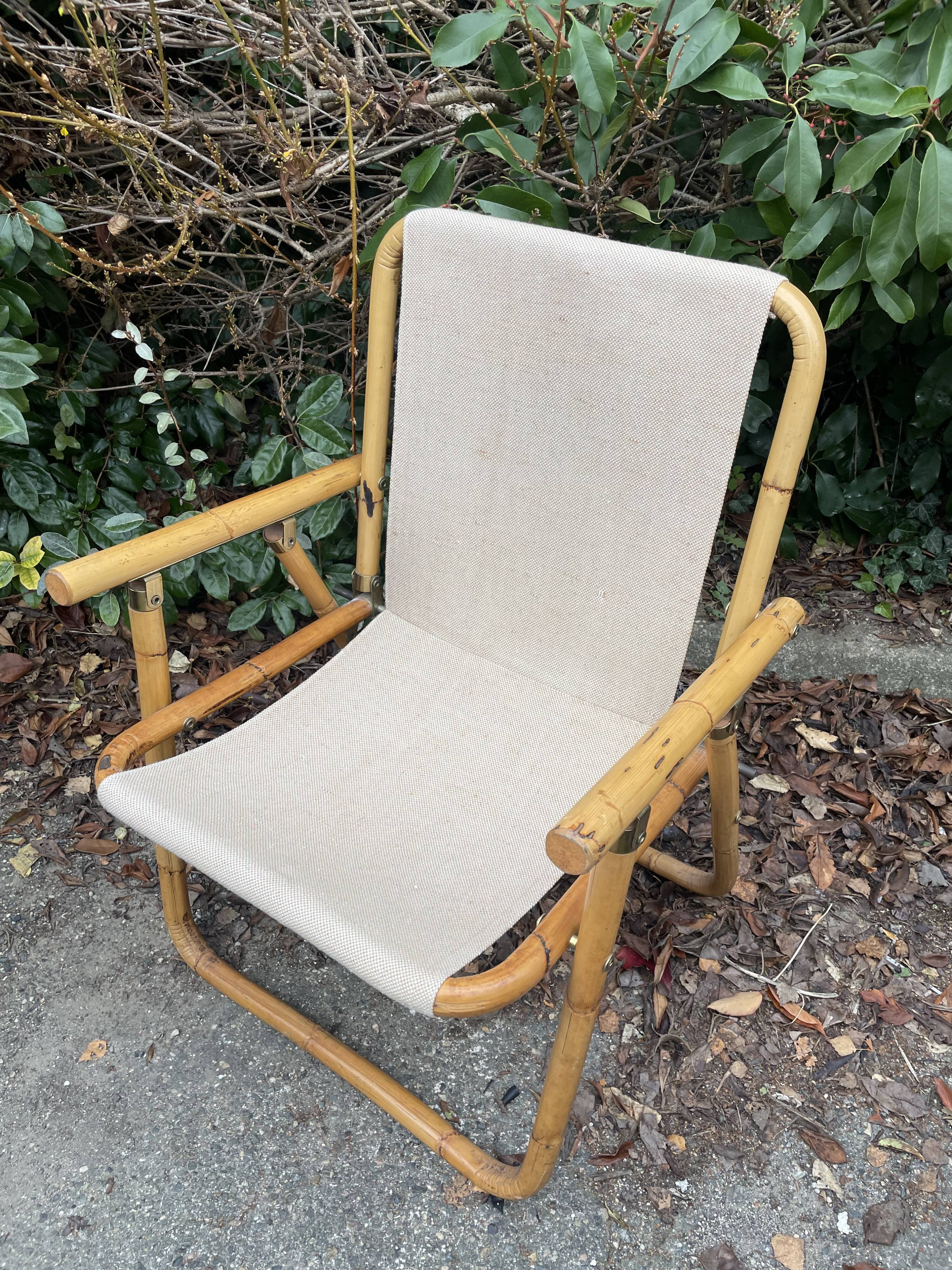 Rattan armchair and foldable canvas